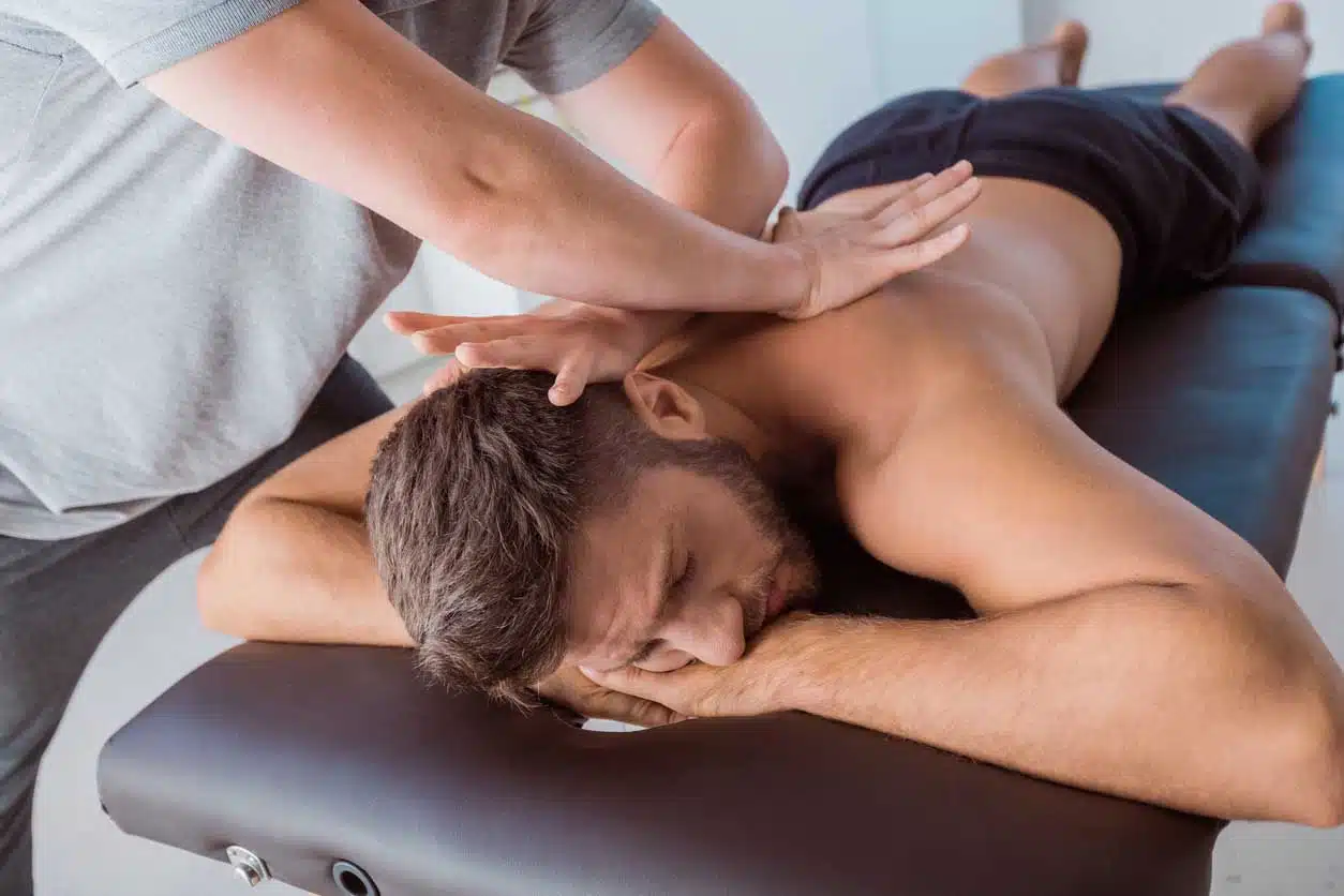 A man getting a back massage | Massage Therapy