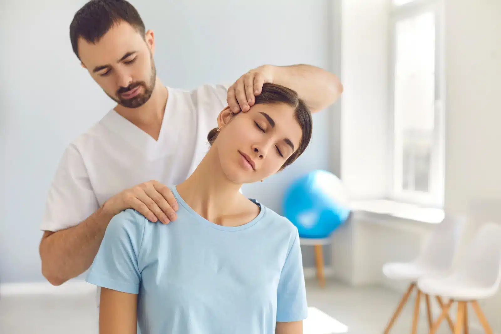 Chiropractic Doctor with a Patient