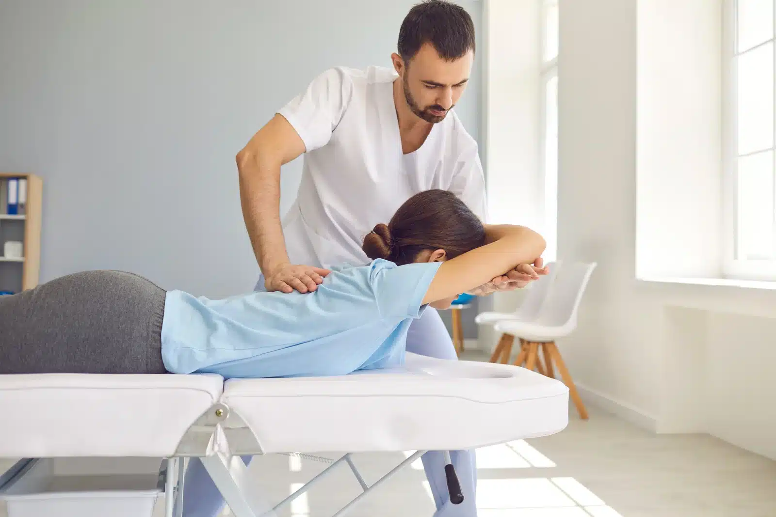 A man getting a back massage | Massage Therapy