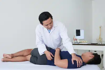 Doctor doing a chiropractic adjustment