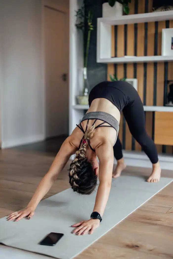 woman stretching with Enhanced Flexibility and Range of Motion after massage therapy