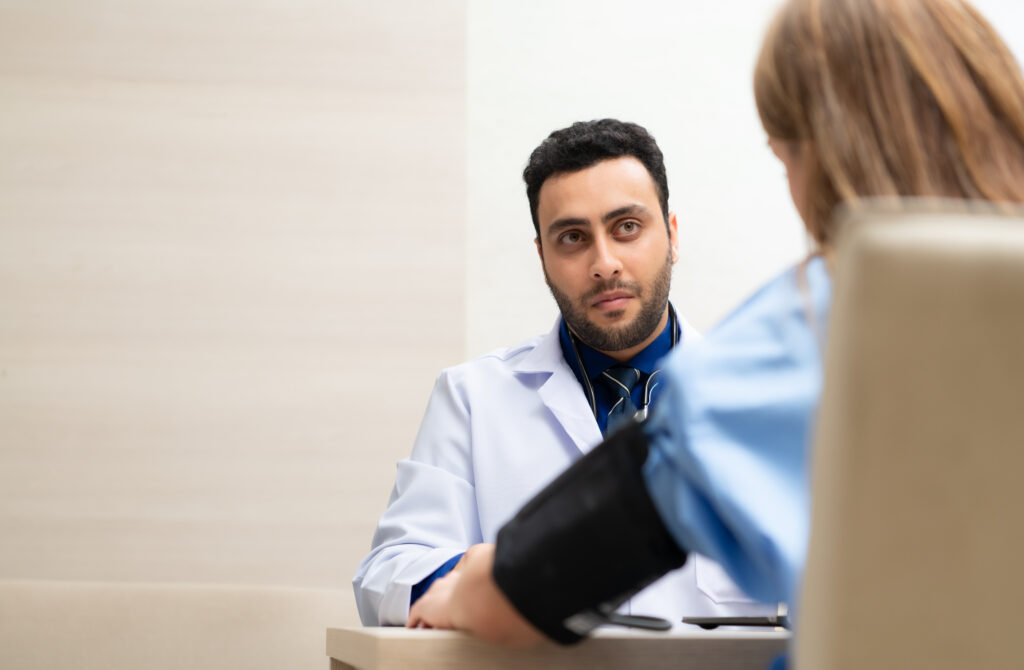 A Patient Getting a Daily Checkup with her Doctor