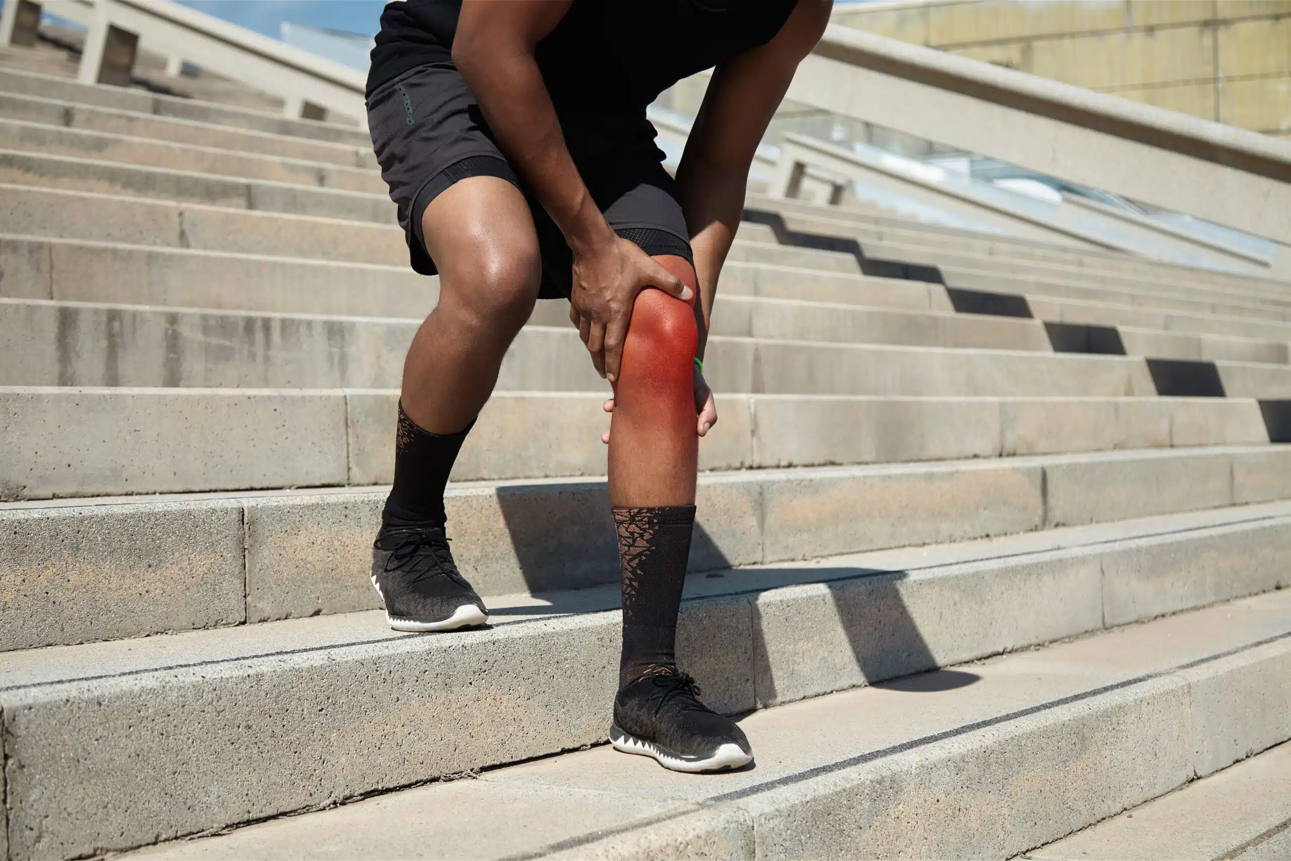 Male Athlete Suffering from Knee and need Joint Pain treatment