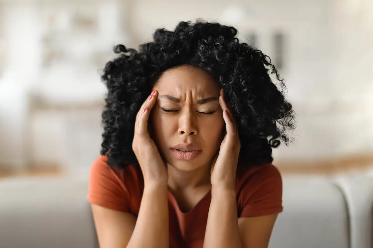 Woman Suffering From Headache and Migraine