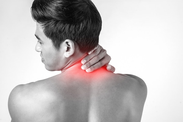muscular man use handles neck relieve pain