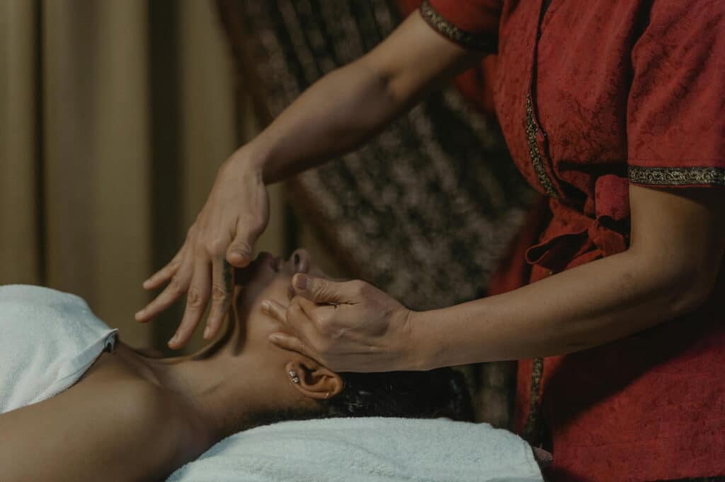 Close-Up Shot of a Masseuse Doing a Thai Massage